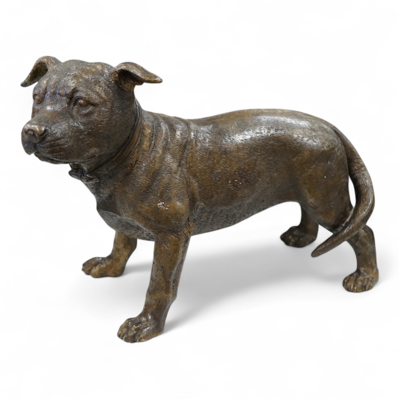 A large solid cast bronze model of a Staffordshire bull terrier, Italian, mid 20th century, signed, 45cm wide